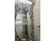 Bathroom with mosaic tile, oval mirror, and modern vanity at 6327 Yellow Buckeye Dr # 6327, Riverview, FL 33578