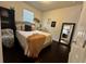 Bedroom with a double bed and large mirror at 6327 Yellow Buckeye Dr # 6327, Riverview, FL 33578