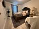 Bedroom with a double bed and neutral color scheme at 6327 Yellow Buckeye Dr # 6327, Riverview, FL 33578