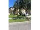 Two-story house with a front yard and driveway at 6327 Yellow Buckeye Dr # 6327, Riverview, FL 33578