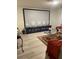 Home theater with large projection screen and media console at 6327 Yellow Buckeye Dr # 6327, Riverview, FL 33578