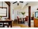Inviting dining room with hardwood floors, modern decor, and an open layout, perfect for entertaining at 10020 Jungle St, New Port Richey, FL 34654
