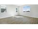 Bright, airy bedroom with multiple windows offering ample natural light at 5936 Jensen View Ave, Apollo Beach, FL 33572