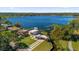 Stunning aerial view showcasing the lakefront property with dock access at 501 Chastain Rd, Seffner, FL 33584