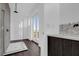 Spacious bathroom with a walk-in shower, stylish tile, and access to a private balcony at 501 Chastain Rd, Seffner, FL 33584