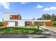 Modern two-story home with a carport and landscaped yard at 501 Chastain Rd, Seffner, FL 33584