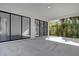 Covered patio area with sliding glass doors leading to the interior at 501 Chastain Rd, Seffner, FL 33584