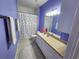 Charming bathroom with vanity and polka dot shower curtain at 4333 Bayside Village Dr # 314, Tampa, FL 33615