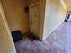 Condo entrance features front door with a welcome mat in a tiled walkway at 4333 Bayside Village Dr # 314, Tampa, FL 33615