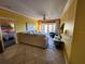 Inviting living room with comfortable seating and direct access to bedroom and patio at 4333 Bayside Village Dr # 314, Tampa, FL 33615