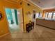 Bright living room features a tiled floor, and a peek of the exterior patio at 4333 Bayside Village Dr # 314, Tampa, FL 33615