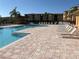 Enjoy resort-style living with a pool and deck furnished with lounge chairs at 4333 Bayside Village Dr # 314, Tampa, FL 33615