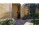 Condo building exterior showcasing a walkway and landscaping at 4333 Bayside Village Dr # 314, Tampa, FL 33615