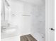 Clean bathroom with double vanity, marble shower, and updated fixtures at 22112 Mamaroneck Ave, Port Charlotte, FL 33952