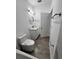 Charming bathroom featuring a modern vanity, mirror, and wood-look tile floor at 183 Wright Drive, Rotonda West, FL 33947
