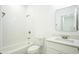 Bathroom featuring a white sink and white tile walls at 183 Wright Drive, Rotonda West, FL 33947