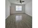 This bedroom features neutral paint, tiled floors and lots of natural light at 183 Wright Drive, Rotonda West, FL 33947