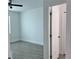 The bedroom features neutral paint and tiled floors at 183 Wright Drive, Rotonda West, FL 33947