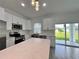 Beautiful kitchen with stainless steel appliances, quartz countertop and backyard view at 183 Wright Drive, Rotonda West, FL 33947