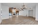 Bright living room boasts vaulted ceilings with beams and a stone fireplace feature at 4907 Parson Brown Ln, Palm Harbor, FL 34684