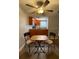 This cozy kitchenette has wood cabinets and modern appliances at 215 Valencia Blvd # 212, Belleair Bluffs, FL 33770