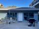 Poolside cabana with table, chairs and a grill, perfect for outdoor gatherings at 215 Valencia Blvd # 212, Belleair Bluffs, FL 33770