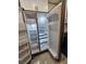 Stainless steel refrigerator offering ample storage within a modern kitchen at 460 Creek Lane Dr, Englewood, FL 34223