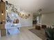 A modern living room boasts elegant decor, stylish lighting, and neutral wall colors at 460 Creek Lane Dr, Englewood, FL 34223
