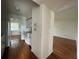 Kitchen featuring white cabinets and appliances and an open view of the home at 7522 Needle Leaf Pl # 27, Tampa, FL 33617