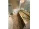 Bathroom with double sinks, granite countertop, soaking tub, and a separate glass shower at 7139 Colony Pointe Dr, Riverview, FL 33578