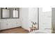 Modern bathroom featuring double sinks, an oversized mirror, and a soaking tub at 125 Baytree Dr, Rotonda West, FL 33947