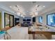 Spacious recreation room featuring ample seating, table games, and modern decor at 8292 Shooting Star Rd, Sarasota, FL 34241