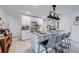 Modern kitchen island with bar seating, stainless steel appliances, and granite counters at 1236 7Th Nw Ave, Ruskin, FL 33570