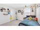 Bright bedroom with window, decorated with personal effects and cozy decor at 7522 Rosewood Garden Loop, Tampa, FL 33637