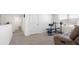 Bonus room with exercise equipment and a reclining couch at 7522 Rosewood Garden Loop, Tampa, FL 33637