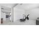 Versatile bonus room with marble floors, featuring easy access to main living spaces and a relaxing sitting area at 7522 Rosewood Garden Loop, Tampa, FL 33637
