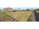Fenced community dog park with grassy area, providing a safe space for pets to play at 7522 Rosewood Garden Loop, Tampa, FL 33637