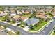 Desirable home aerial with palm trees, green lawns, and well-maintained surroundings in a desirable neighborhood at 2640 Suncoast Lakes Blvd, Punta Gorda, FL 33980