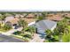 Lovely home aerial showcasing lush landscaping, manicured lawn, and a pristine driveway, highlighting meticulous care at 2640 Suncoast Lakes Blvd, Punta Gorda, FL 33980