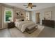 Comfortable bedroom with a plush bed, bedside tables, and windows offering a serene view at 2640 Suncoast Lakes Blvd, Punta Gorda, FL 33980