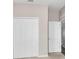 A room with neutral walls, carpet, a window, and closet that offers ample storage at 2640 Suncoast Lakes Blvd, Punta Gorda, FL 33980