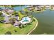Aerial image features a community pool and surrounding landscape at 2640 Suncoast Lakes Blvd, Punta Gorda, FL 33980