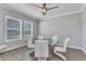 Bright dining room with modern light fixture and table set at 2640 Suncoast Lakes Blvd, Punta Gorda, FL 33980