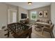 Fun game room with a foosball table, comfortable seating, and a modern entertainment setup at 2640 Suncoast Lakes Blvd, Punta Gorda, FL 33980