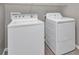 Laundry room featuring a modern washer and dryer at 2640 Suncoast Lakes Blvd, Punta Gorda, FL 33980