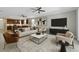 Bright and open living room featuring stylish furniture, modern decor, and an inviting atmosphere at 2640 Suncoast Lakes Blvd, Punta Gorda, FL 33980