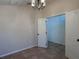 Bright, empty room with tile floors, natural light, and white trim at 675 Hartford Heights St, Spring Hill, FL 34609