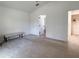 Large bedroom with neutral carpet, light-colored walls, and walk-in closet at 675 Hartford Heights St, Spring Hill, FL 34609
