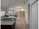 Spacious kitchen with granite countertops offers seamless flow into the living area at 675 Hartford Heights St, Spring Hill, FL 34609