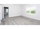 Bright bedroom with neutral carpet and a large window offering plenty of natural light at 14552 Skipping Stone Loop, Parrish, FL 34219